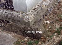 Pudding stone in base of tower